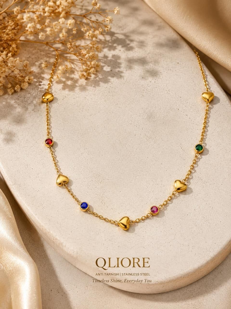 Gold heart station necklace with coloured stones